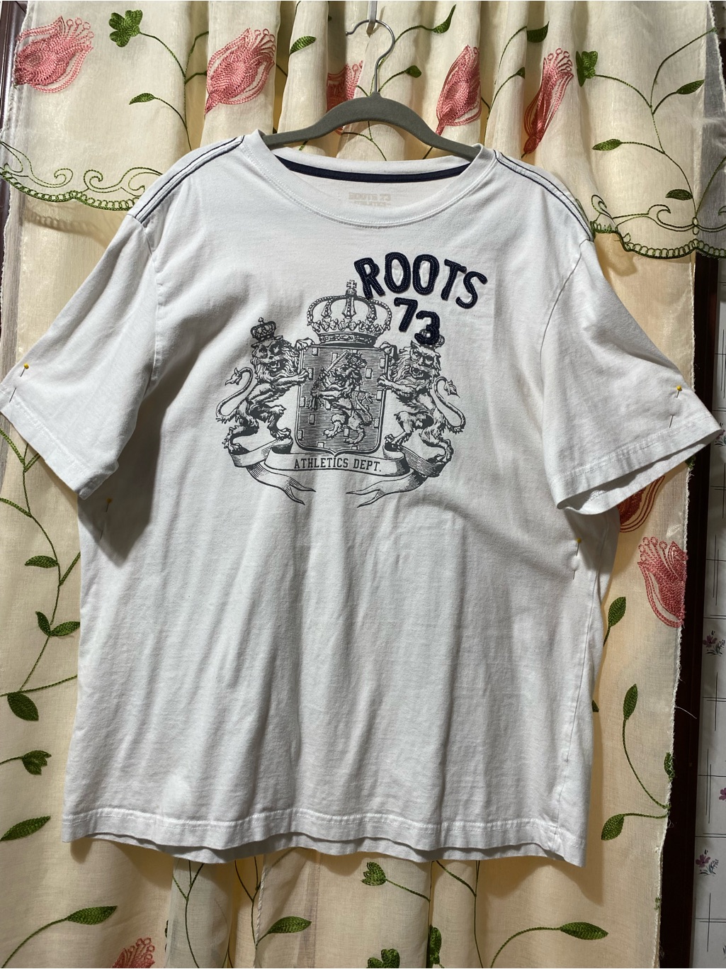 Roots White Tee With Navy Crest Graphic
